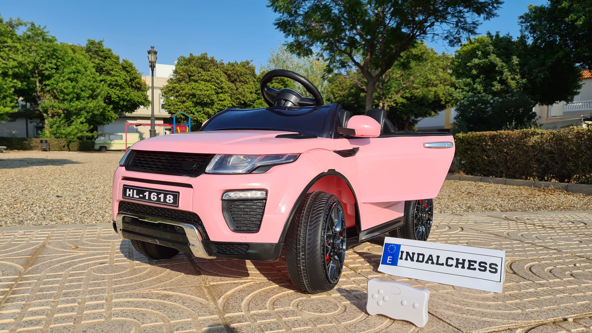 COCHE INFANTIL RANGE RAPID 12V - ROSA, Coches eléctricos y motos para niños a batería 12v con mando RC, quads infantiles, camiones para niños, a domicilio.